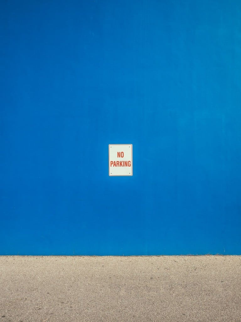 Blue wall with simple rules on it no parking Generative Change Life Changing Coaching Online By Phone
